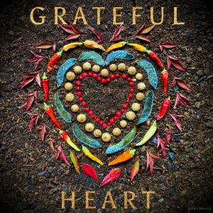 Heart shaped Earth Altars design made of berries, nuts, peppers and leaves
