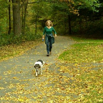 Margaret Wakeley walking her dog, Ollie.
