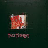 pink graffiti with the phrase take time 4 love