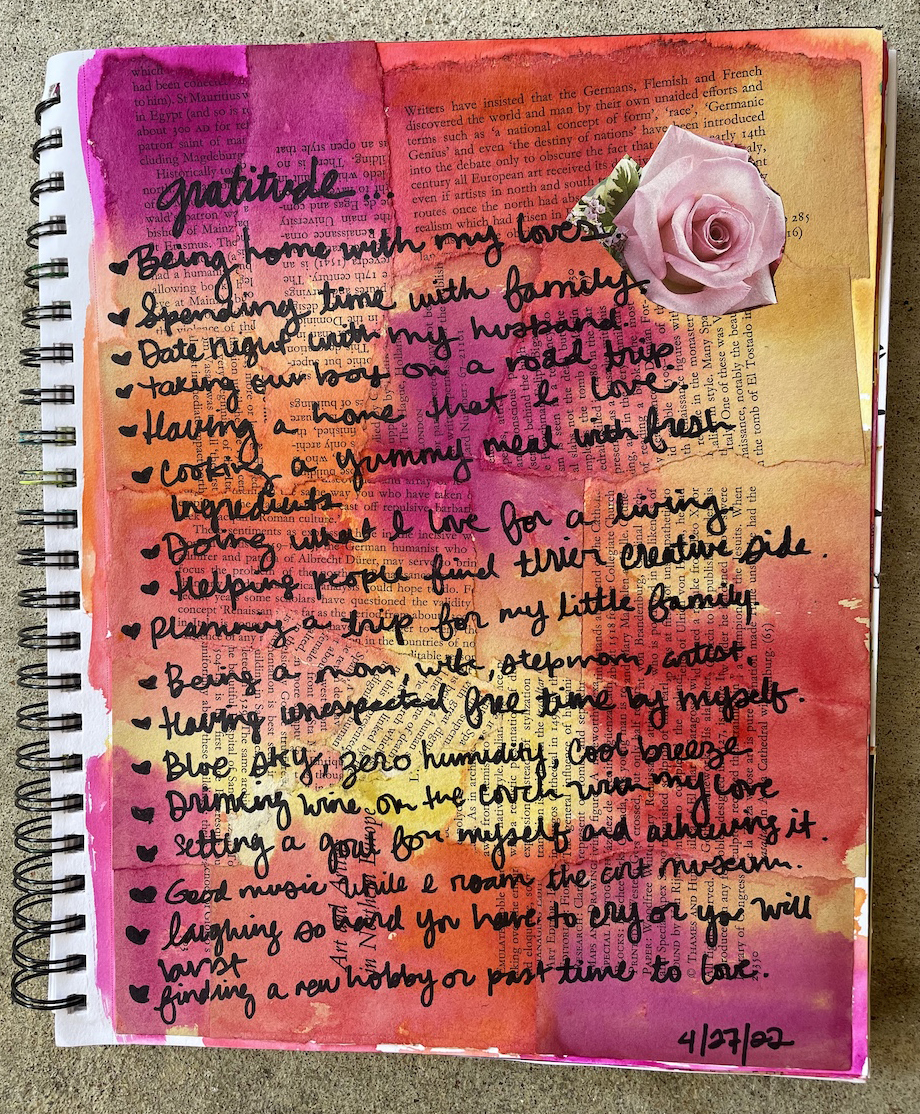 Page of a gratitude art journal with pink and orange watercolor background, a rose photo, and gratitude list